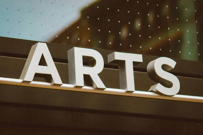 The word "arts" in bold letters.